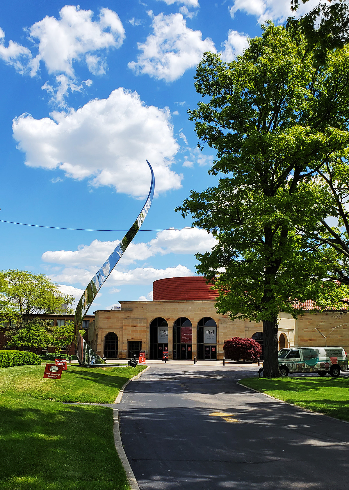 This image shows the sculpture Pathway, by John Safer, with the museum's entrance rotunda in the background.